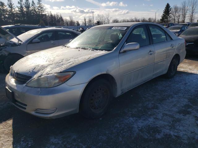 TOYOTA CAMRY LE 2002 with VIN JTDBE32K920001838 - Photo from auction