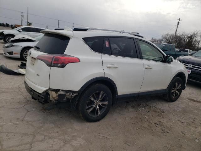 Photo 3 from auction – 2017 TOYOTA RAV4 XLE with VIN JTMWFREV7HJ110163