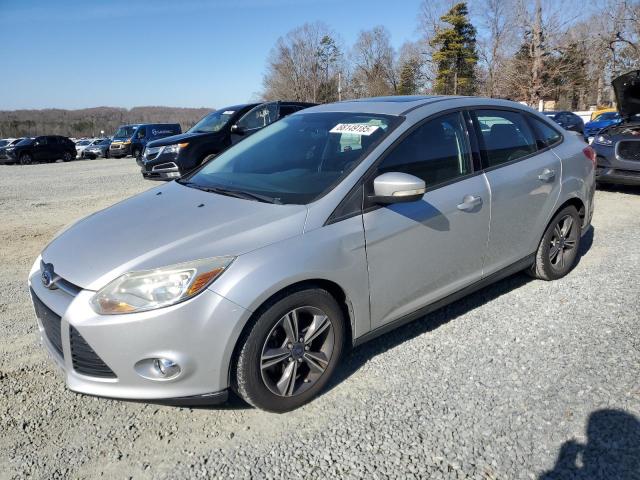 FORD FOCUS SE 2014 with VIN 1FADP3F28EL227083 - Photo from auction