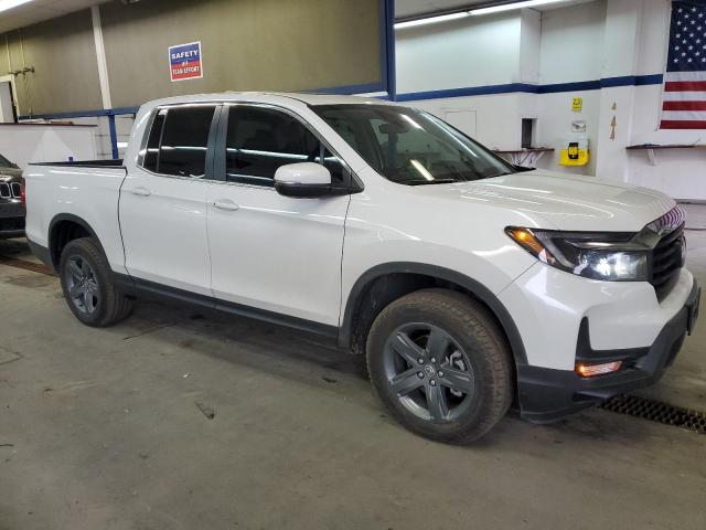 Photo 4 from auction – 2023 HONDA RIDGELINE with VIN 5FPYK3F53PB063517