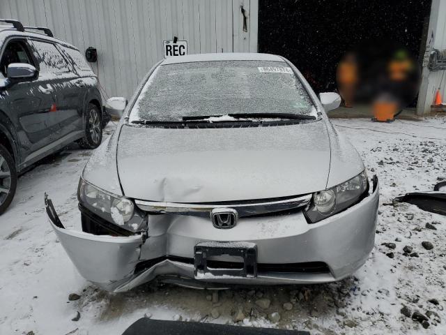 Photo 5 from auction – 2006 HONDA CIVIC HYBR with VIN JHMFA36256S024999