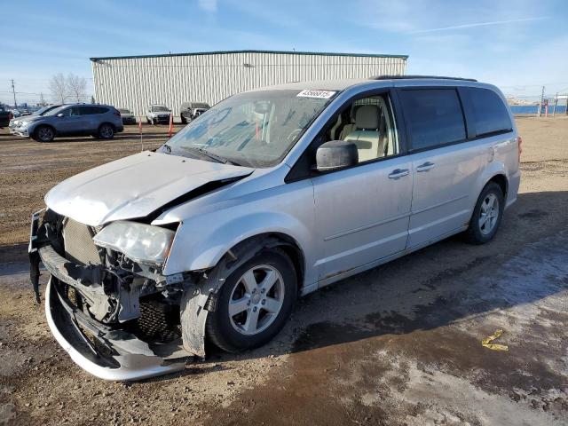 DODGE GRAND CARA 2011 with VIN 2D4RN4DGXBR778535 - Photo from auction