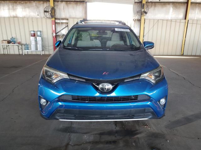 Photo 5 from auction – 2016 TOYOTA RAV4 XLE with VIN JTMWFREV4GJ062992