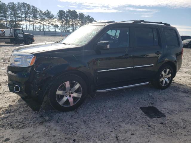HONDA PILOT TOUR 2014 with VIN 5FNYF3H98EB010497 - Photo from auction