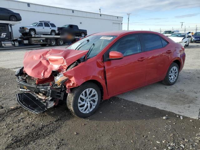 TOYOTA COROLLA L 2018 with VIN 5YFBURHE9JP786034 - Photo from auction
