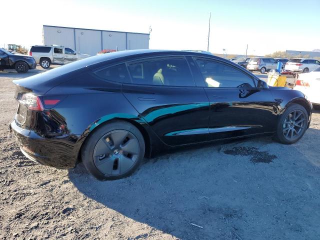 Photo 3 from auction – 2022 TESLA MODEL 3 with VIN 5YJ3E1EBXNF119214