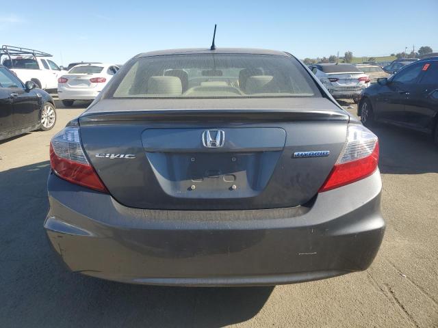 Photo 6 from auction – 2012 HONDA CIVIC HYBR with VIN JHMFB4F29CS000641