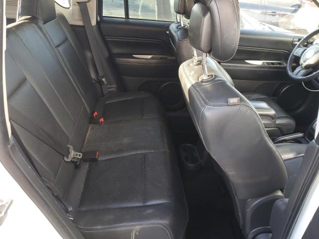 Photo 11 from auction – 2014 JEEP COMPASS AL with VIN 1C4NJCEA8ED814239