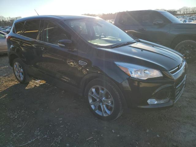 Photo 4 from auction – 2013 FORD ESCAPE SEL with VIN 1FMCU0HX0DUB66029
