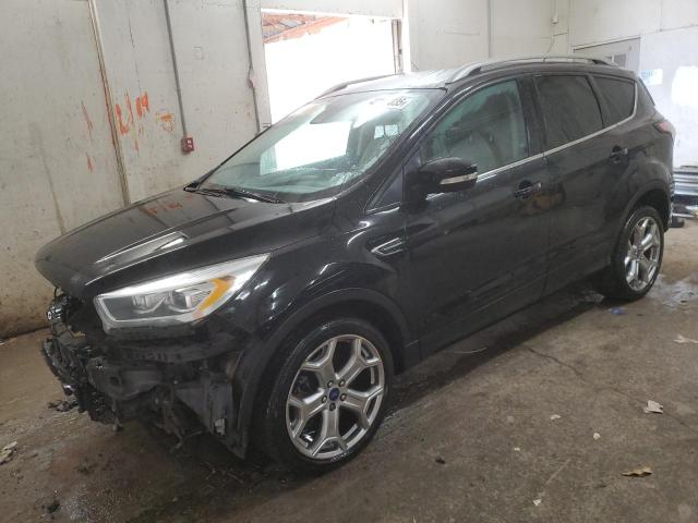 FORD ESCAPE TIT 2017 with VIN 1FMCU0J93HUA48784 - Photo from auction