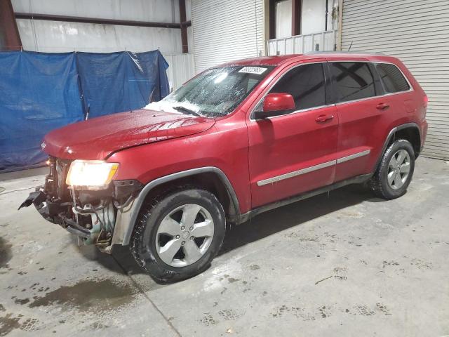 JEEP GRAND CHER 2011 with VIN 1J4RR4GG4BC558873 - Photo from auction