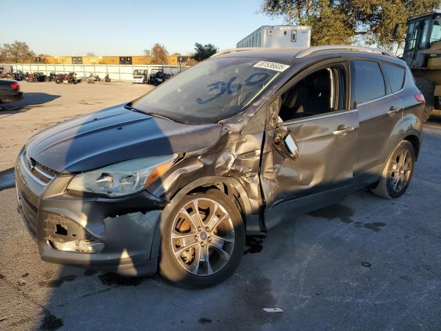 FORD ESCAPE TIT 2014 with VIN 1FMCU0J97EUC89999 - Photo from auction