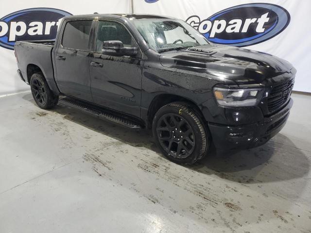 Photo 4 from auction – 2023 RAM 1500 LARAM with VIN 1C6SRFJT5PN540183