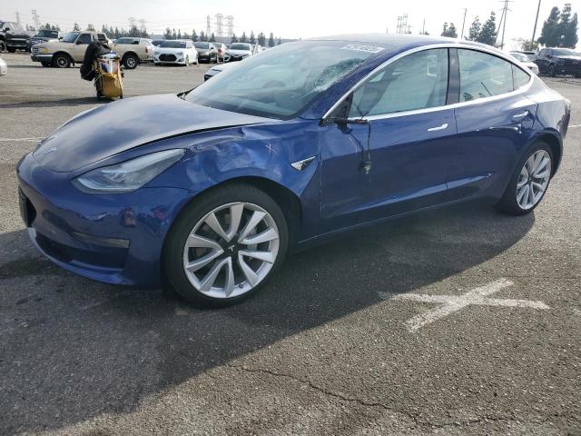 TESLA MODEL 3 2020 with VIN 5YJ3E1EAXLF662728 - Photo from auction