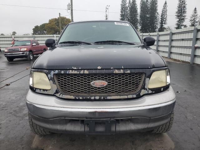 Photo 5 from auction – 2003 FORD F150 with VIN 1FTRX17L23NA89375