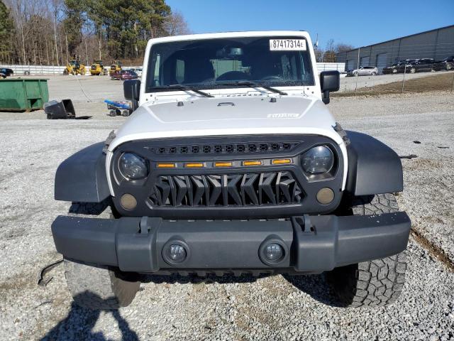 Photo 5 from auction – 2014 JEEP WRANGLER U with VIN 1C4BJWDG0EL229123