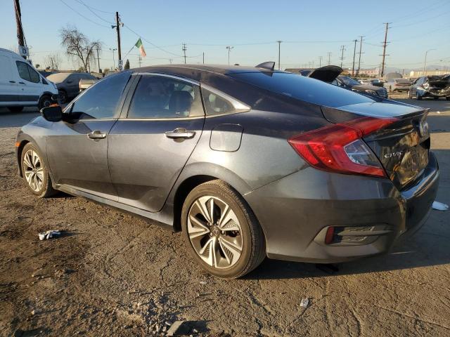 Photo 2 from auction – 2017 HONDA CIVIC EX with VIN 2HGFC1F35HH642439