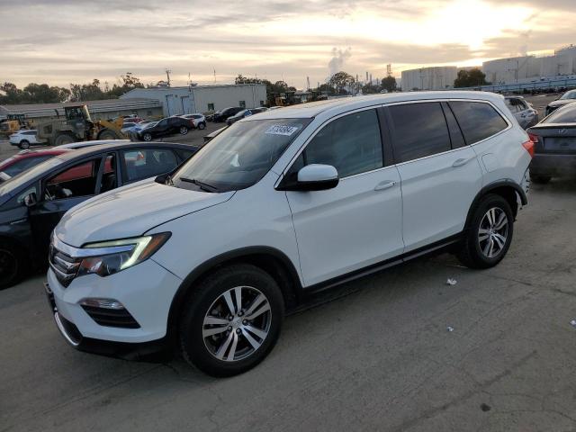 HONDA PILOT EXL 2018 with VIN 5FNYF5H60JB016631 - Photo from auction