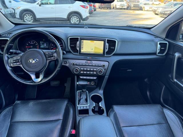 Photo 9 from auction – 2017 KIA SPORTAGE E with VIN KNDPNCAC6H7056344
