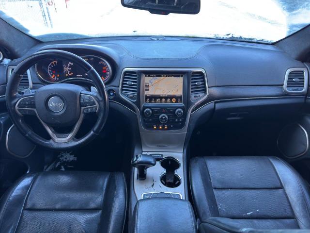 Photo 9 from auction – 2014 JEEP GRAND CHER with VIN 1C4RJFJT5EC359124