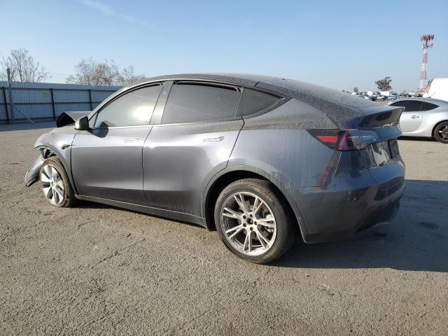 Снимка 2 от търг – 2023 TESLA MODEL Y с VIN 7SAYGDEE8PF855764