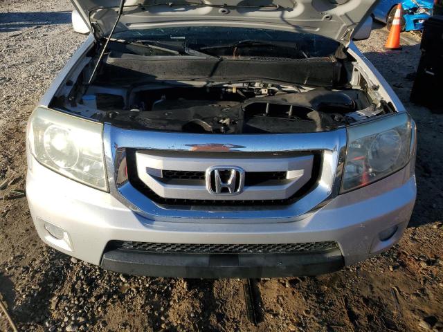 Photo 12 from auction – 2009 HONDA PILOT EX with VIN 5FNYF48409B046667