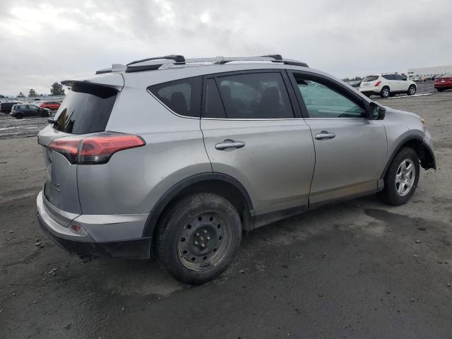 Photo 3 from auction – 2018 TOYOTA RAV4 LE with VIN 2T3BFREV9JW850383