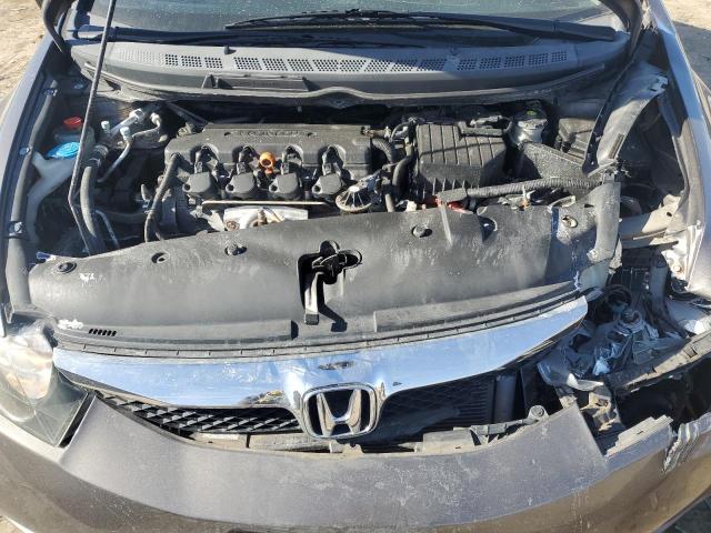 Photo 11 from auction – 2011 HONDA CIVIC LX-S with VIN 19XFA1F60BE036838