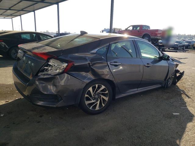 Photo 3 from auction – 2017 HONDA CIVIC EX with VIN 19XFC2F78HE215291