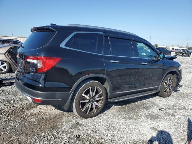 Photo 3 from auction – 2022 HONDA PILOT ELIT with VIN 5FNYF6H08NB042871