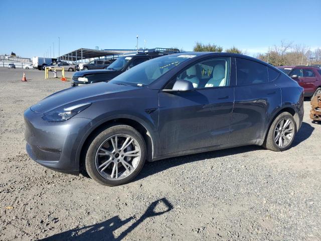 TESLA MODEL Y 2023 with VIN 7SAYGDEE1PF634586 - Photo from auction