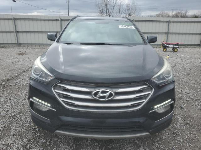 Photo 5 from auction – 2017 HYUNDAI SANTA FE S with VIN 5NMZU3LB9HH032788