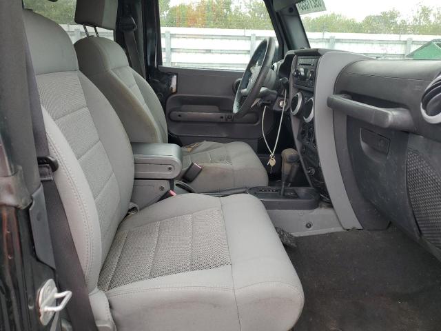 Photo 11 from auction – 2009 JEEP WRANGLER S with VIN 1J4FA54109L702963