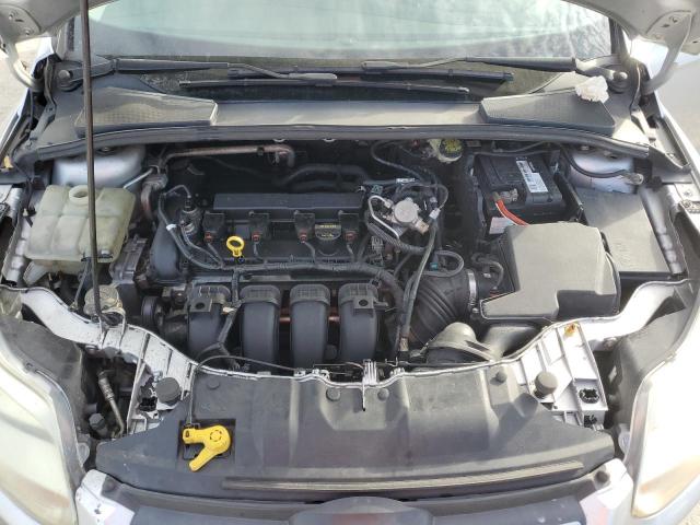 Photo 11 from auction – 2014 FORD FOCUS S with VIN 1FADP3E24EL369190