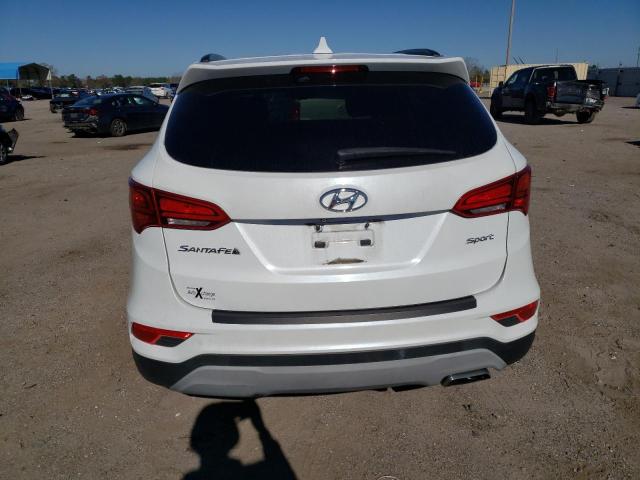 Photo 6 from auction – 2018 HYUNDAI SANTA FE S with VIN 5NMZU3LB7JH095152