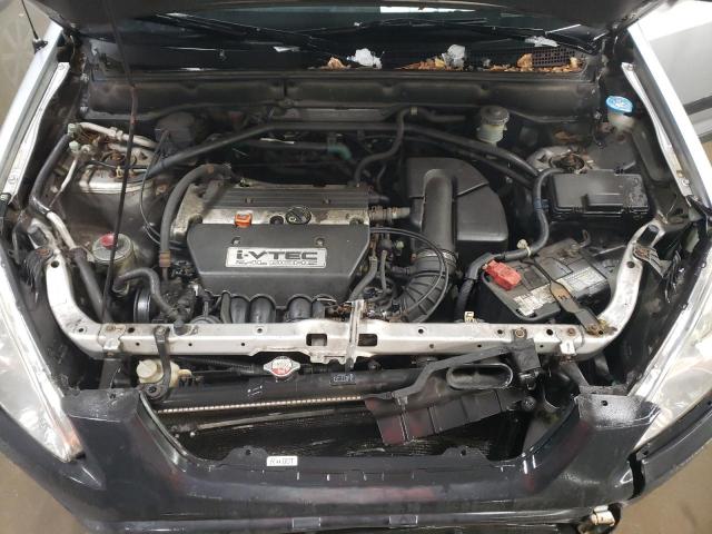Photo 11 from auction – 2002 HONDA CR-V LX with VIN JHLRD68512C009941