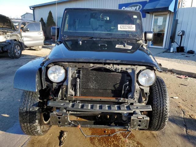 Photo 5 from auction – 2015 JEEP WRANGLER U with VIN 1C4BJWEG7FL764739