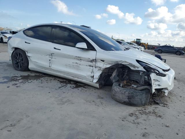 Photo 4 from auction – 2021 TESLA MODEL 3 with VIN 5YJ3E1EA9MF922845