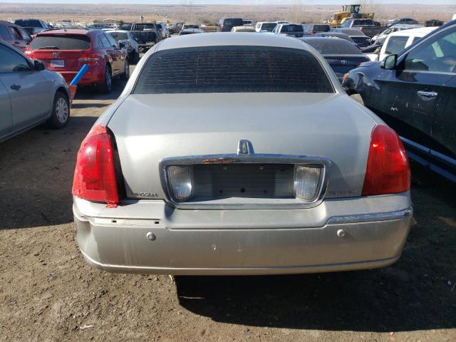 Photo 6 from auction – 2004 LINCOLN TOWN CAR U with VIN 1LNHM83W94Y659204