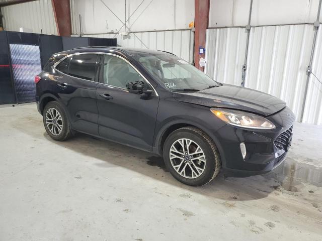 Photo 4 from auction – 2021 FORD ESCAPE SEL with VIN 1FMCU9H66MUA51110