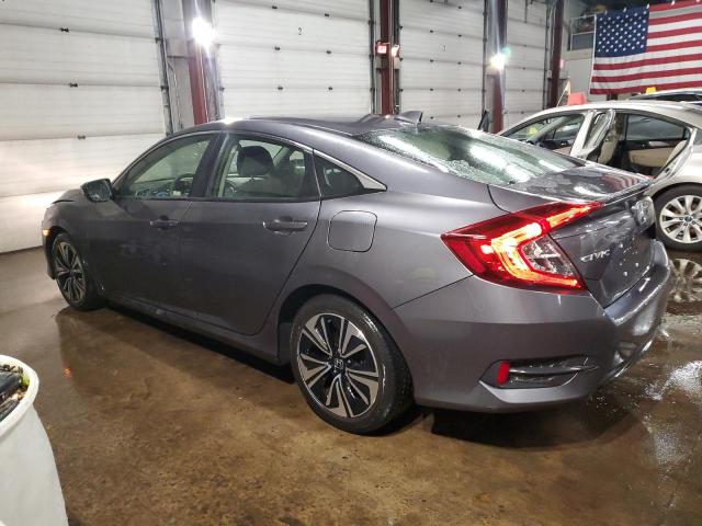 Photo 2 from auction – 2018 HONDA CIVIC EX with VIN JHMFC1F36JX018924