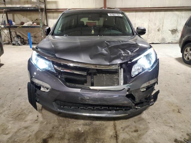 Photo 5 from auction – 2017 HONDA PILOT ELIT with VIN 5FNYF6H08HB103706