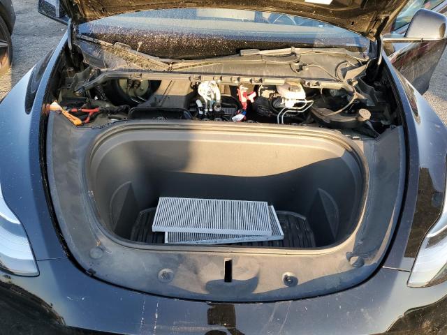 Photo 11 from auction – 2023 TESLA MODEL Y with VIN 7SAYGDEE7PA029050