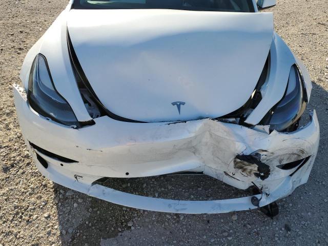 Photo 11 from auction – 2021 TESLA MODEL 3 with VIN 5YJ3E1EA4MF066659