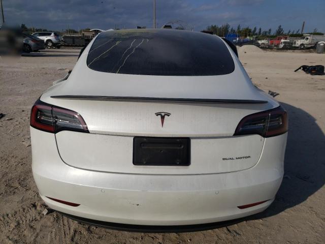 Photo 6 from auction – 2021 TESLA MODEL 3 with VIN 5YJ3E1EB8MF044754