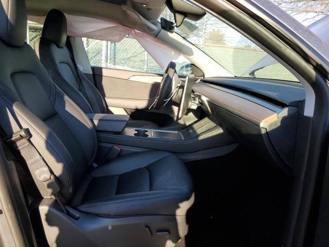 Photo 7 from auction – 2023 TESLA MODEL Y with VIN 7SAYGDEE6PF831687