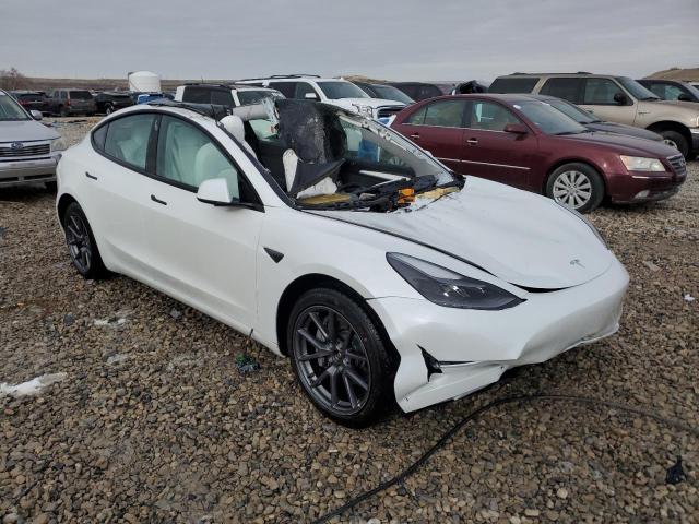 Photo 4 from auction – 2021 TESLA MODEL 3 with VIN 5YJ3E1EBXMF992959