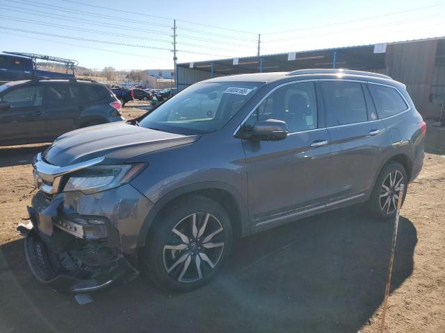 HONDA PILOT TOUR 2021 with VIN 5FNYF6H67MB089330 - Photo from auction