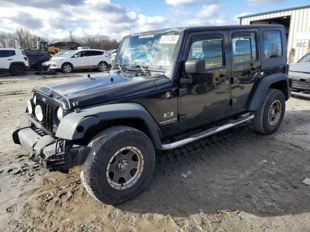 JEEP WRANGLER U 2009 with VIN 1J4GA39169L738495 - Photo from auction