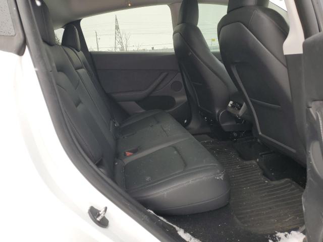 Photo 11 from auction – 2023 TESLA MODEL Y with VIN LRWYGDEE3PC106989